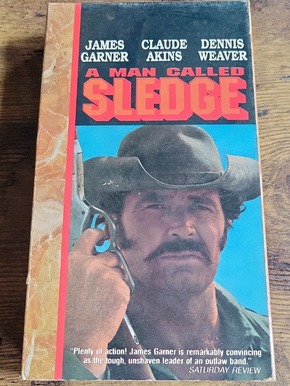 A Man Called Sledge Vintage Movie VHS Cover - Red, Black, Blue
